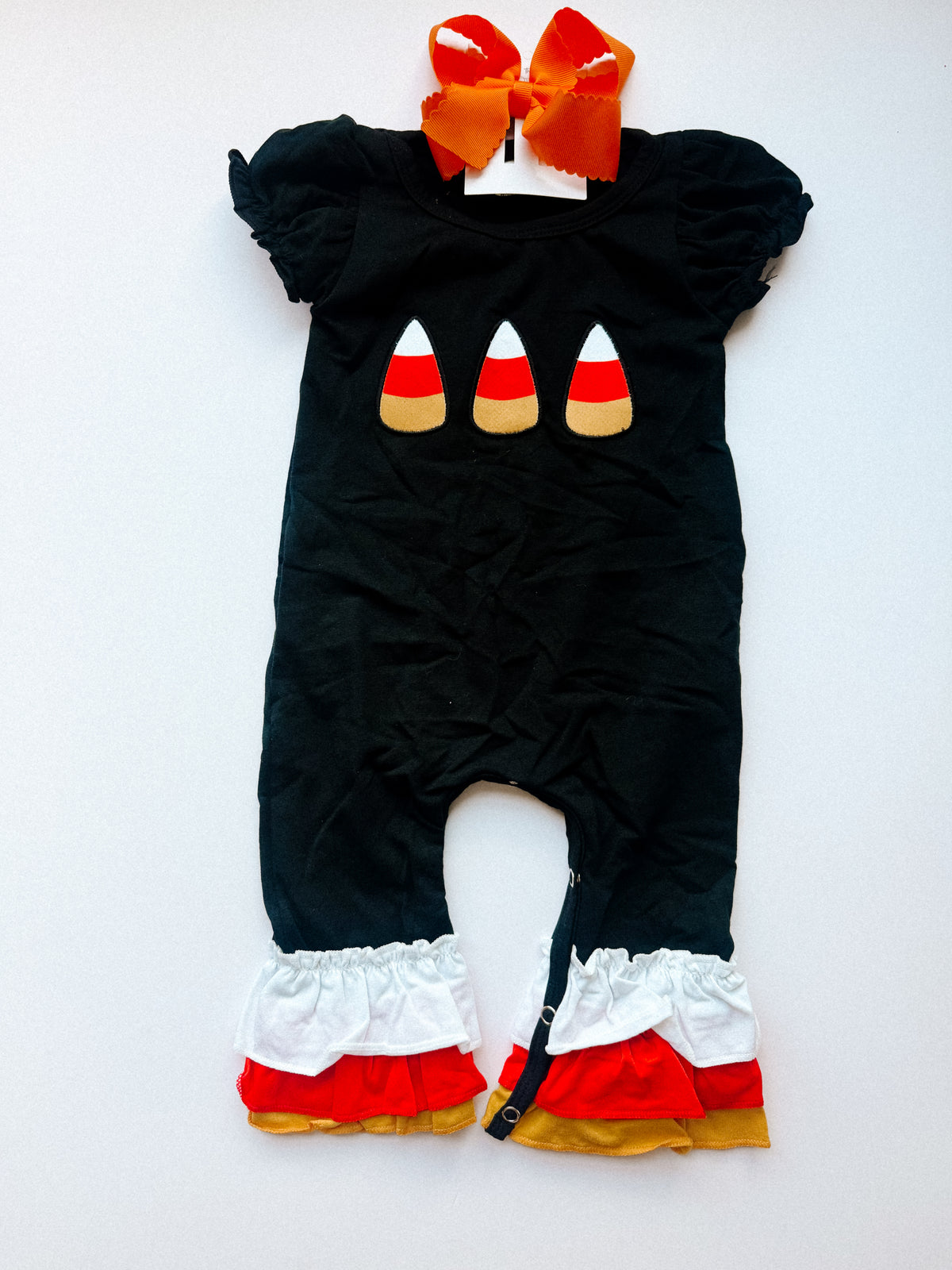 Candy corn ruffle romper